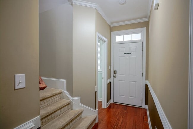 Building Photo - End unit townhome |  Fenced backyard | Har...