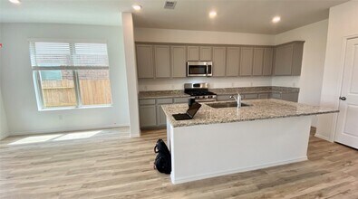 Building Photo - 26610 Daylily Grove St