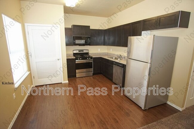 Building Photo - 8685 N Loop Dr