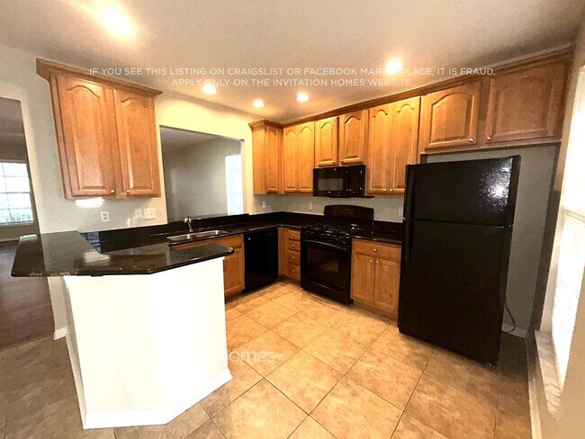 Foto del edificio - 5901 Grand Loneoak Ln