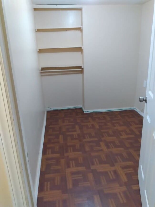 Building Photo - 3 bedrooms on the 3rd Floor with Central Hot Air, and an Available backyard