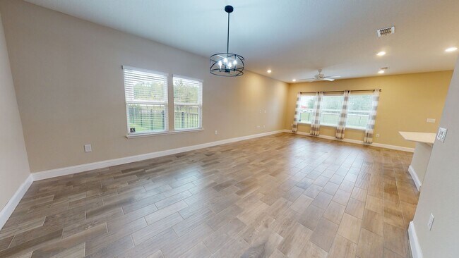 Building Photo - Feel right at home in this spacious, fully...