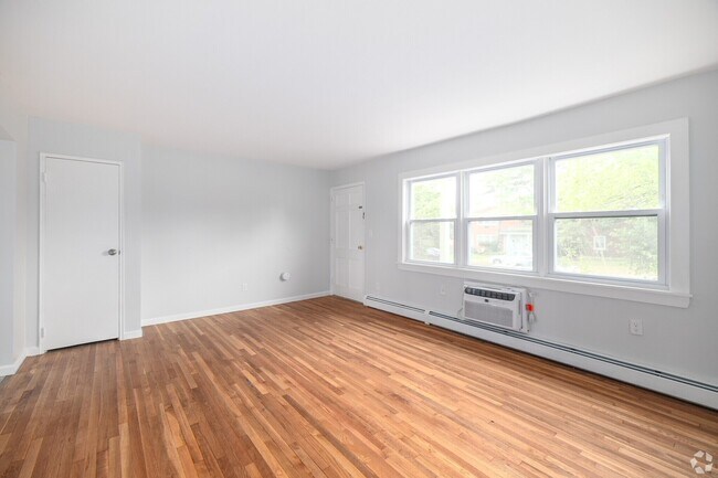 Sala de estar - Pinewood Apartments