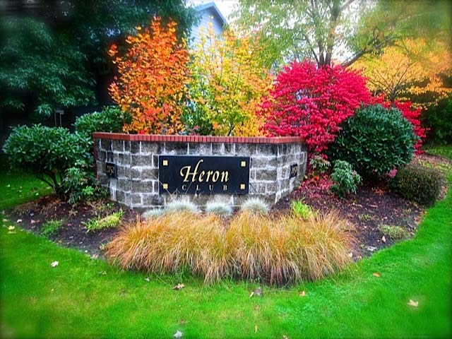 Sign - The Heron Club