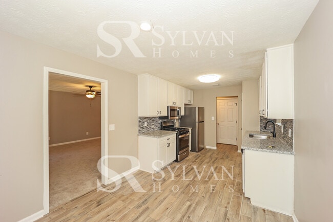 Building Photo - Lease today! No extra charge for contentme...