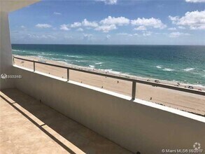 Building Photo - 5555 Collins Ave