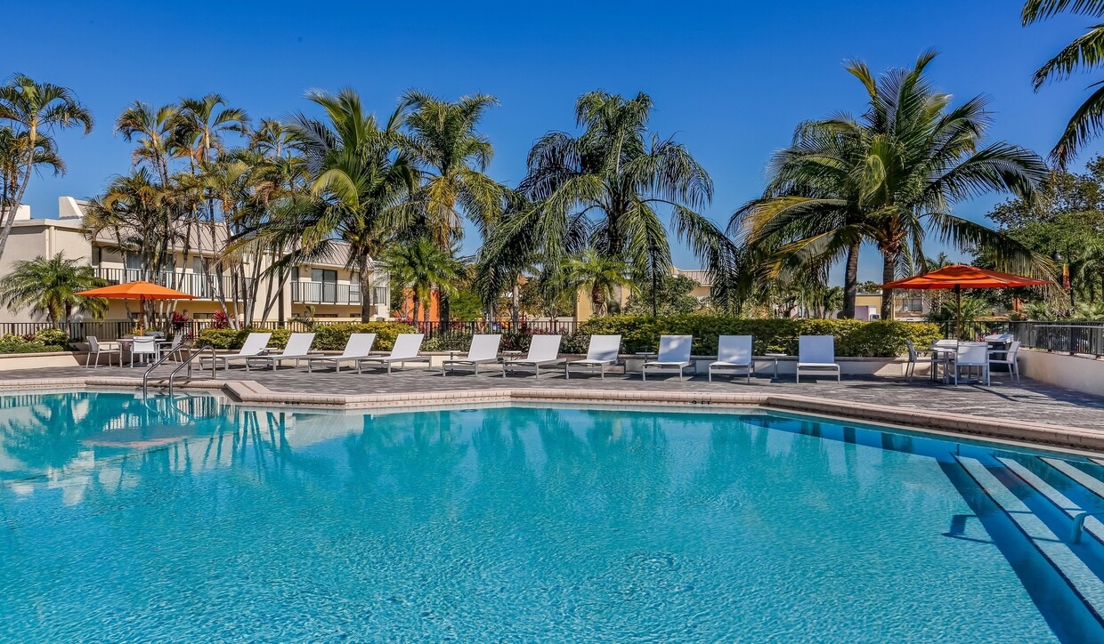 Outdoor resort-style pool and sundeck - Four Quarters