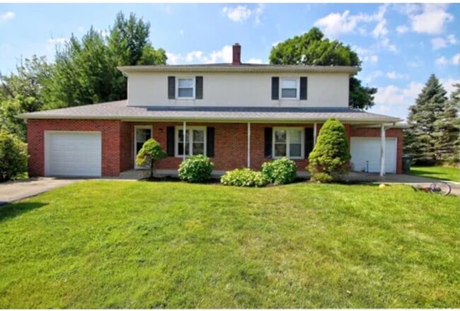 Front of Property, 8653 is the unit on the left - 8653 Refugee Rd