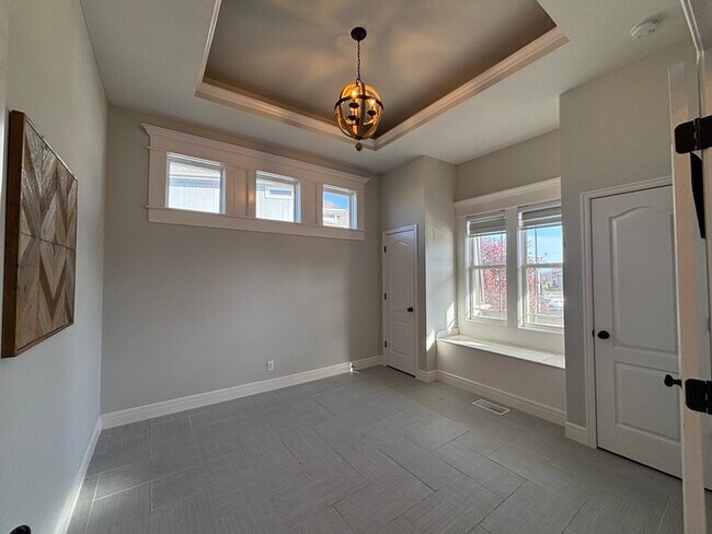 Building Photo - Modern Olathe Beauty with Covered Lanai, Loft & Main-Level Primary Suite