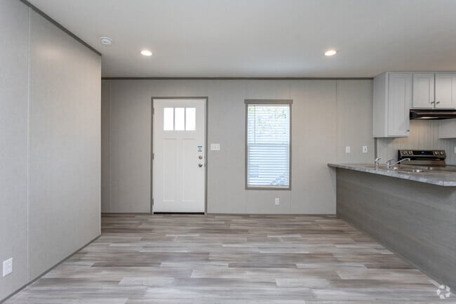 3BR, 2BA - 1,216SF - Living Room - Hunter Ridge