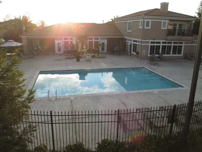 Pool with clubhouse and fitness center - 4200 E Commerce Way