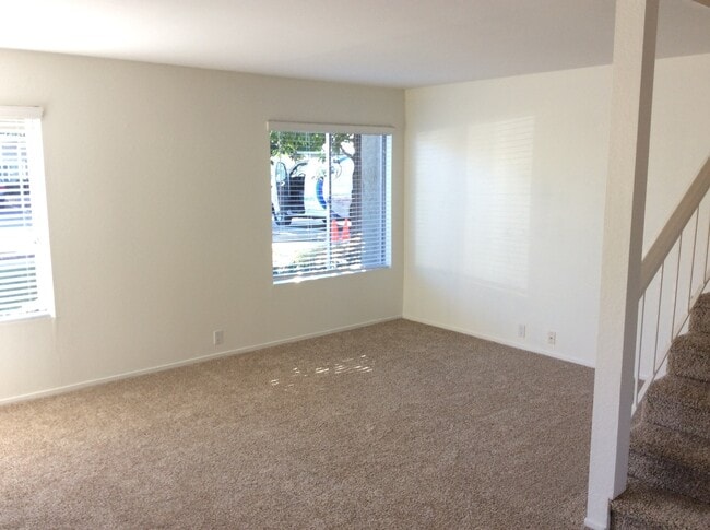 Building Photo - HIGHLY DESIRED, UPGRADED TOWNHOME W/ PATIO...