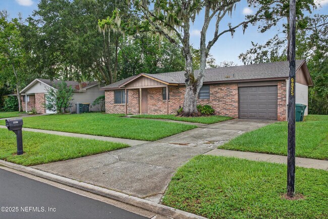 Foto del edificio - 9937 Moss Side Ln
