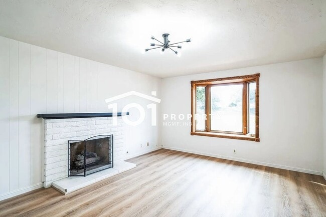 Building Photo - Spacious 4-Bedroom Home with 3 Bathrooms and a 2-Car Garage