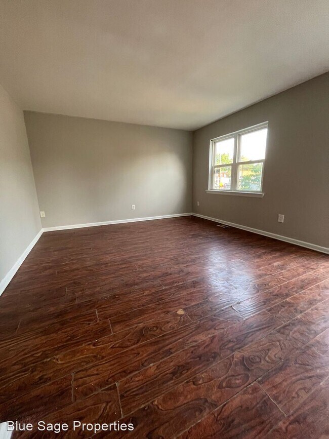 Building Photo - 3 br, 1.5 bath House - 213 E 24th St