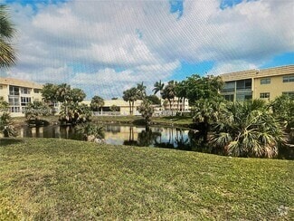 Building Photo - 8285 Sunrise Lakes Blvd