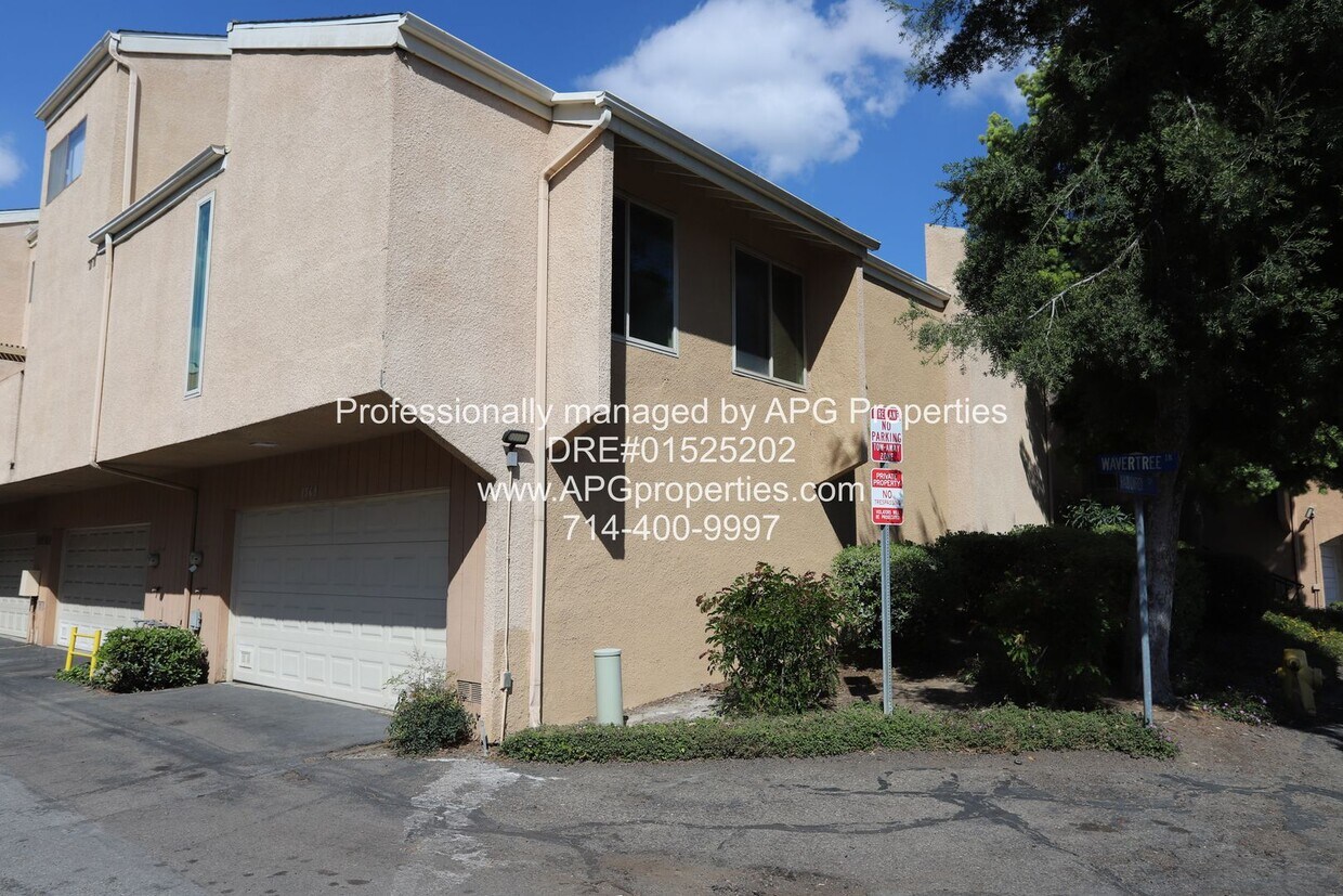 Primary Photo - 2 Bed + 2 bath split level Condo with a 2 ...