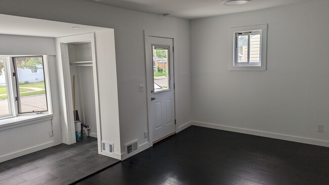 Large Living Room with Ebony Wood Floors - 2145 Browning St