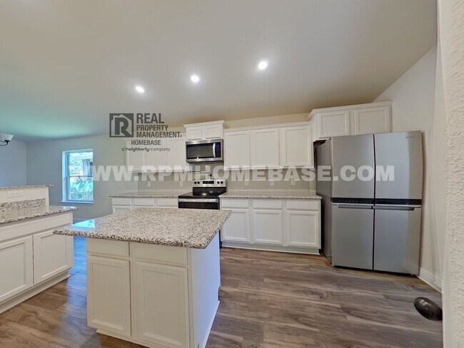 Building Photo - Spacious 3-Bedroom Home in Charming Pace N...