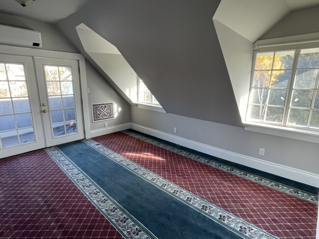 Master bedroom with walk out deck and French Doors - 1007 E 1st Ave