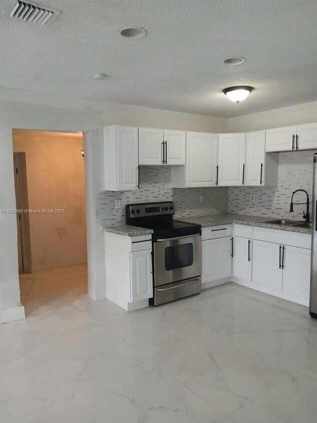 Building Photo - 9845 SW 212th St