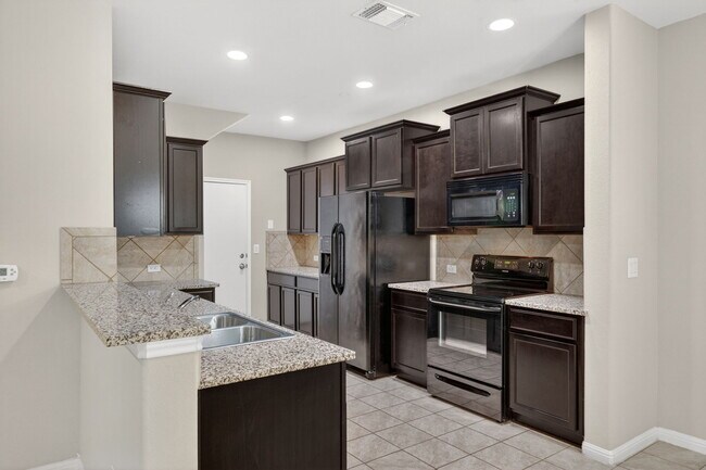 Foto del edificio - 516 E Slaughter Ln
