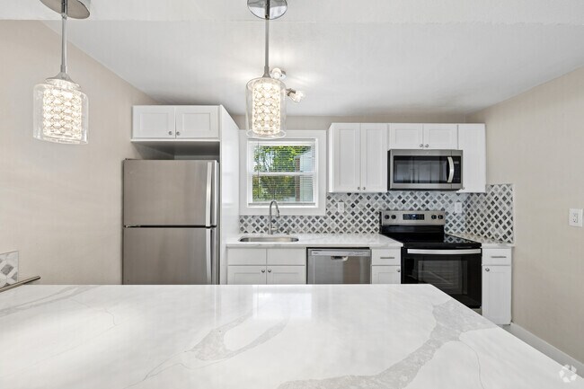 2 habitaciones, 1 baño - 1078 pies cuadrados - Cocina - Atbridge TownHomes