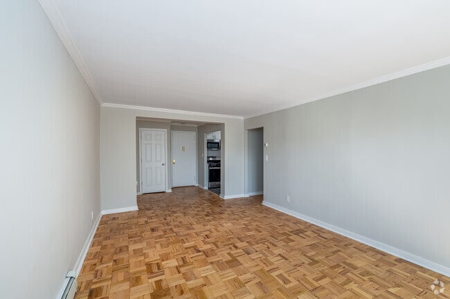 1BR, 1BA - 663SF - Living Room/ Dining Room - Maple Crest Apartments at Williston Park