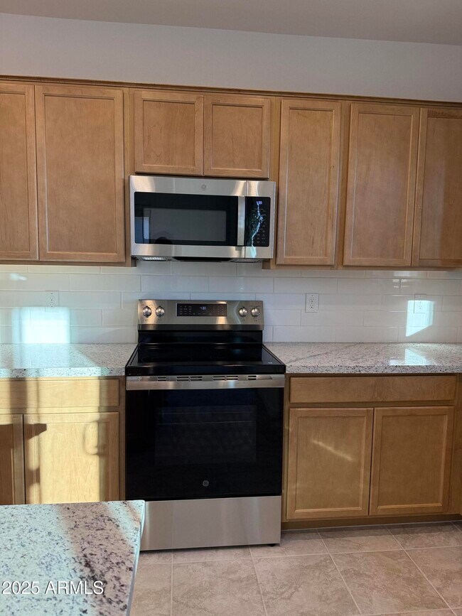 Building Photo - 9973 W Mitchell Ave