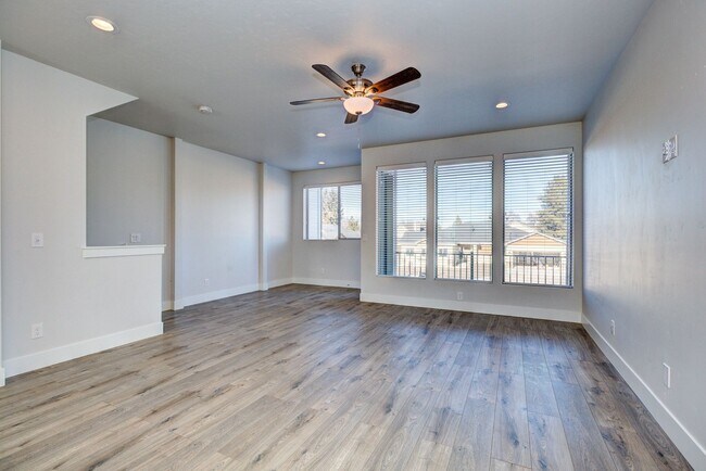 Building Photo - EASY CARE, HIGH EFFICIENCY TRI-LEVEL TOWNH...