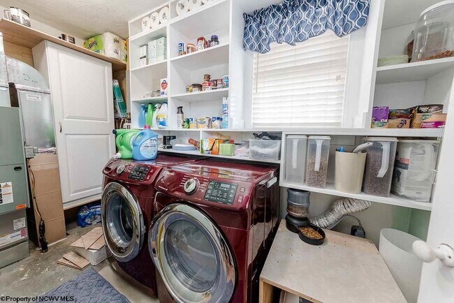Laundry/Utility Room with Pantry Storage - 339 Riverview Ave
