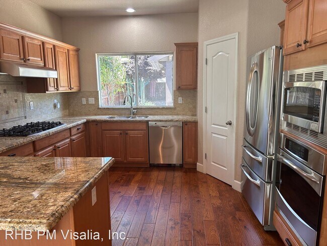 Building Photo - 4 br, 2 bath House - 5038 W Modoc Ave