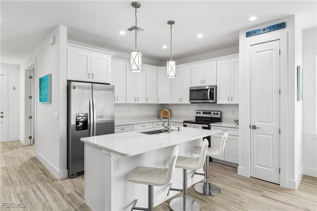 Foto del edificio - 13460 Causeway Palms Cove