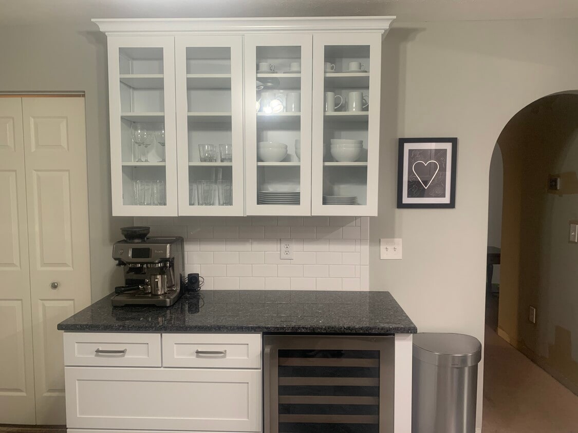 Fully renovated kitchen. High-end CraftMade cabinetry with soft close doors. - 704 Carters Grove Dr