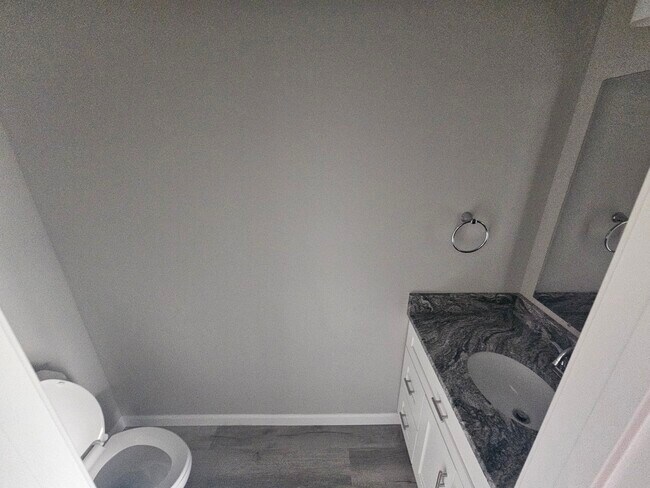 Half bath on 1st floor. - 1510 W 32nd St