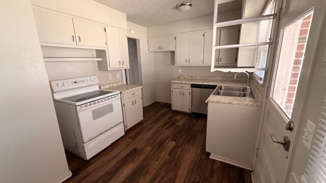 Building Photo - The Carport Cottage: Charming 3-Bedroom Brick Home Available Now.