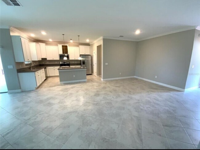Building Photo - "Beautiful 4-Bedroom gated community home ...