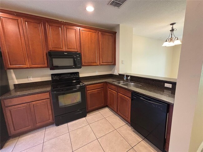 Foto del edificio - 8515 Trail Wind Dr