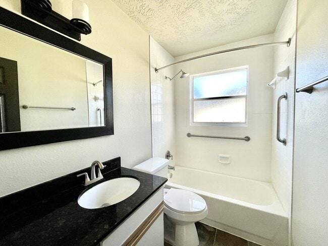 Building Photo - Marquee Uptown & Carriage Square