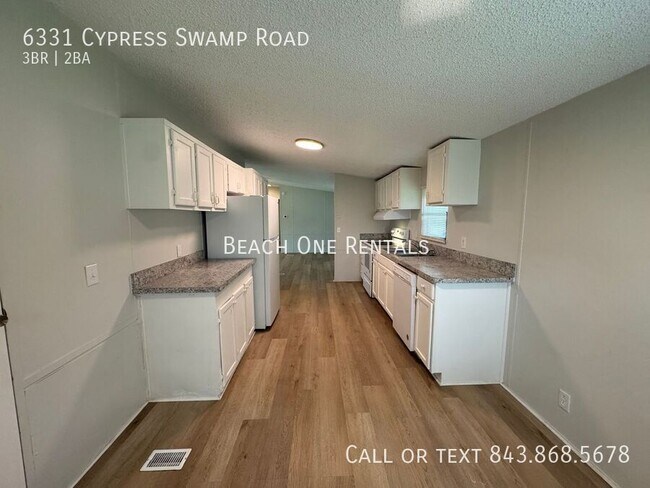 Foto del edificio - 6331 Cypress Swamp Rd