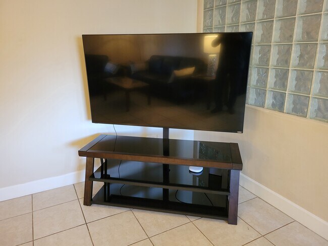 65 inch TV - 7501 E Minnezona Ave
