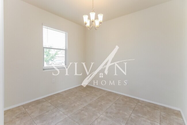 Building Photo - Charming 3BR 2BA features freshly painted ...