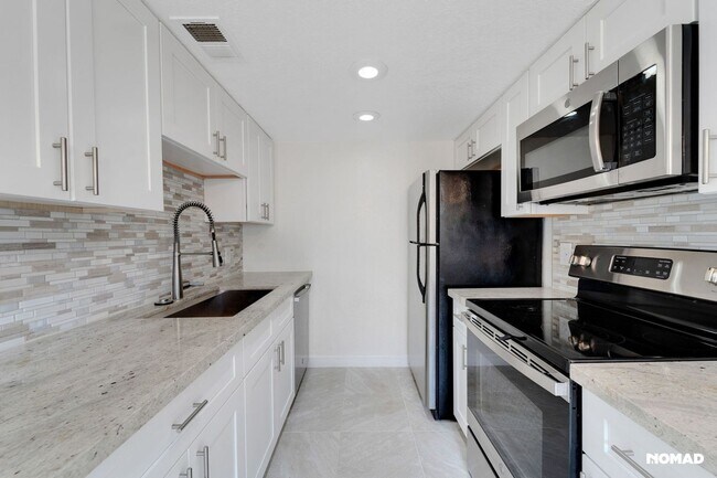 Foto del edificio - Charming 2BR Condo in Phoenix