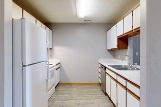 Our kitchens provide plenty of counter space and cabinetry, making meal prep and storage simple and efficient for your lifestyle. - Northbrook Apartments