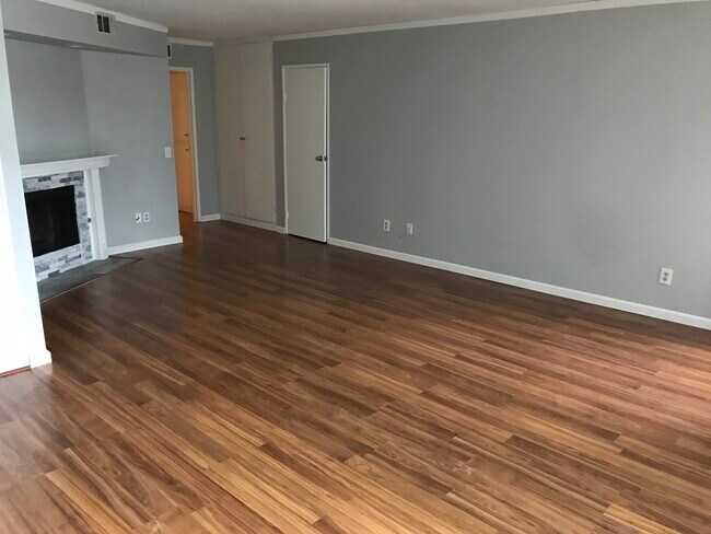 Large living room is open to kitchen and dining room. The perfect space for entertaining. - 3881 Groton St