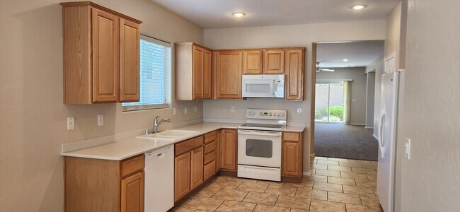 Building Photo - Freshly painted & all new carpeting - 3BR ...