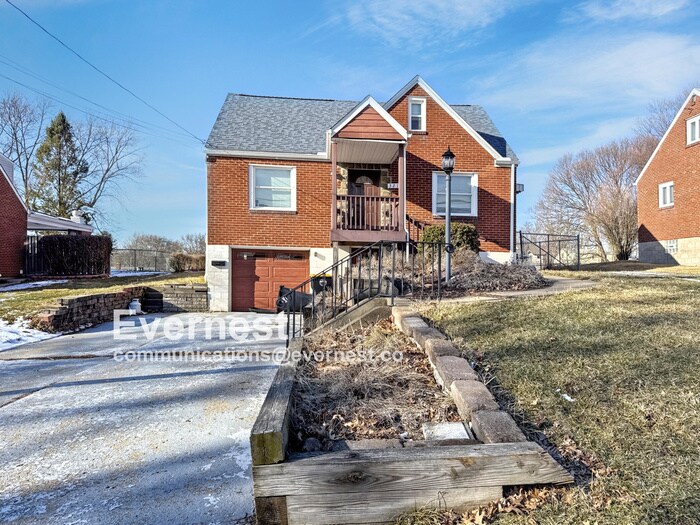 Primary Photo - 3-Bedroom, 2-Bathroom Home with Modern Ame...