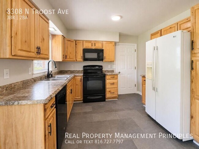 Foto del edificio - 8308 N Troost Ave