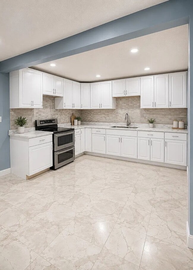 Building Photo - HALF OFF SECURITY DEPOSIT! Fully Renovated 4BR Home with Huge Yard & Off-Street Parking – Section...