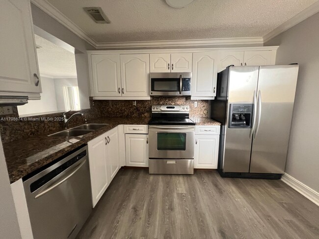 Building Photo - 15711 SW 137th Ave